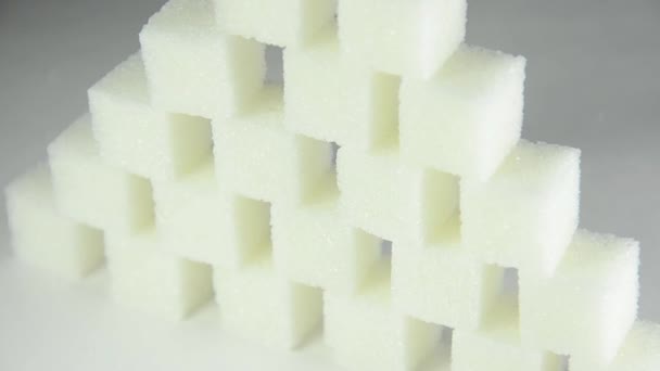 Witte suiker kubussen — Stockvideo