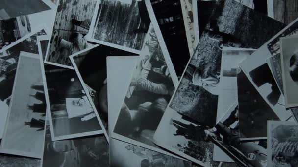 Old photographs scattered — Stock Video