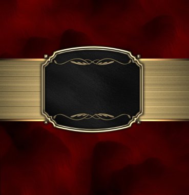 patrón oro en una placa negra sobre un fondo rojo