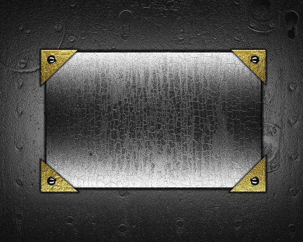 Grunge metal plate with a metal background — Stock Photo, Image