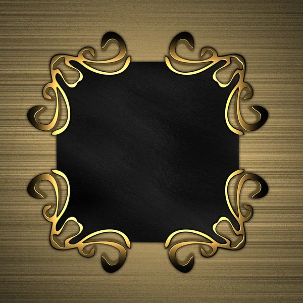 Black plaque with gold patterns on a background of gold — Stock Photo, Image