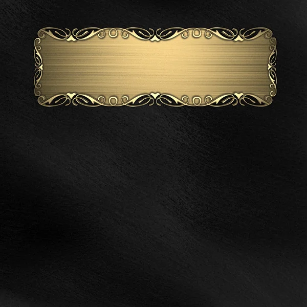 Beautiful pattern on a gold plate on a black background — Stock Photo, Image