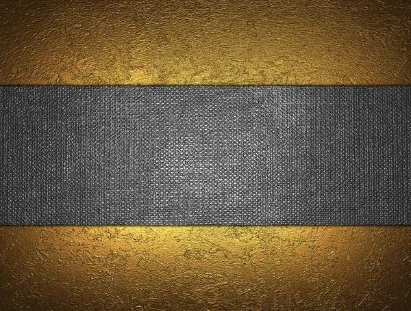 Beautiful gold background with a metal nameplate for writing. — Stock Photo, Image
