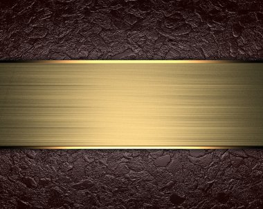 коричневий фону (текстури) з золота табличку для написання.