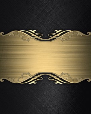 siyah arka plan ile altın bir tabela.