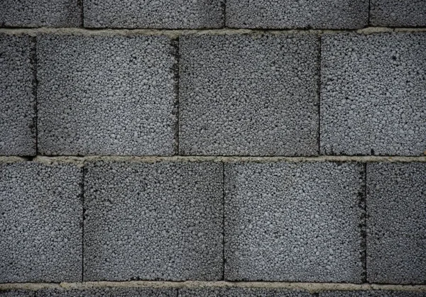 Textura de la pared de ladrillos grises (bloques ) — Foto de Stock