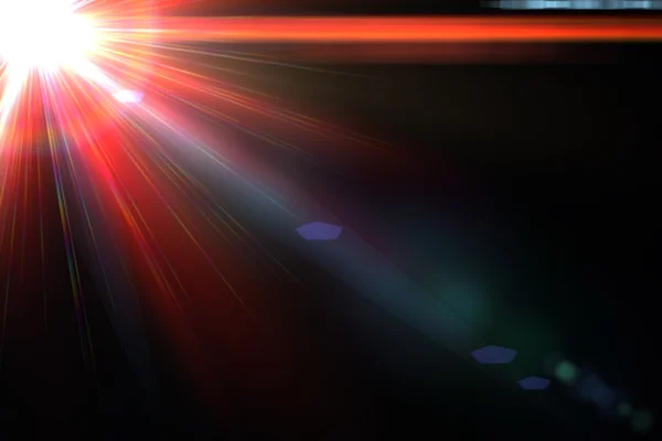 Star, sun with lens flare. Rays red of light on a black background — Stock Photo, Image