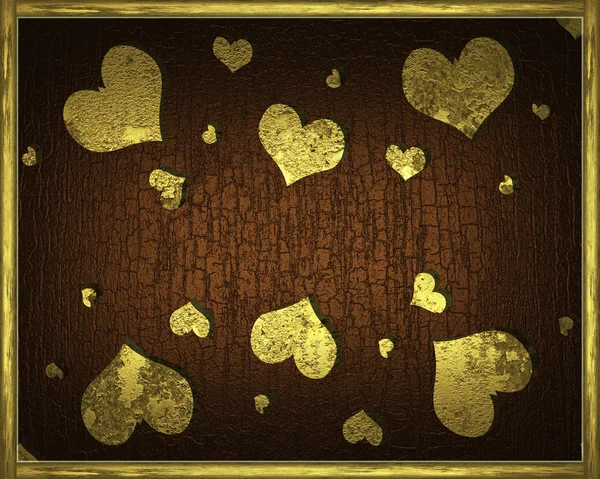 Brown background dark color with gold ribbon on the edges and in the middle of hearts — Stock Photo, Image