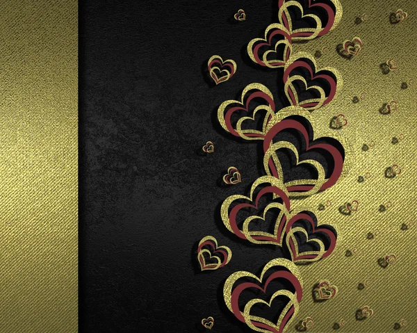 Black background decorated with golden hearts — Stock Photo, Image