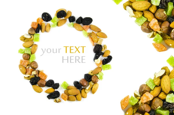 Nuts and dried fruit in the form of a circle of isolation on a white background — Stock Photo, Image