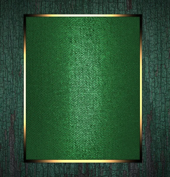 Textura verde con placa de oro con adorno de oro . —  Fotos de Stock