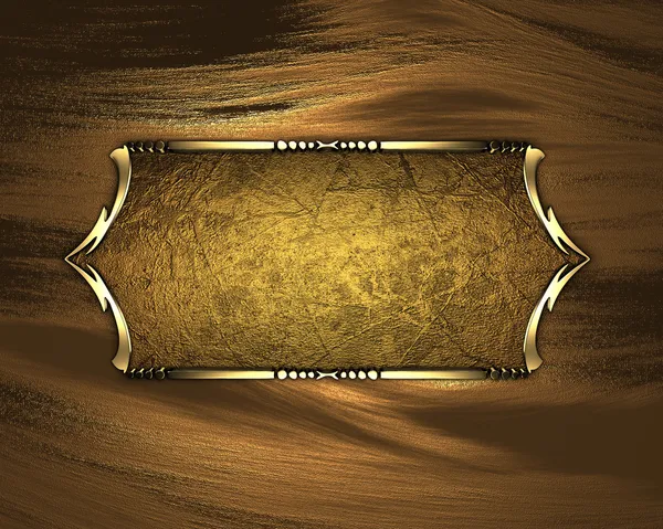 Zwarte naamplaatje met gouden sierlijke randen, op gouden achtergrond — Stockfoto