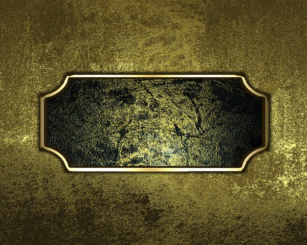 Grunge gold texture with dark name plate with gold ornate edges — Stock Photo, Image