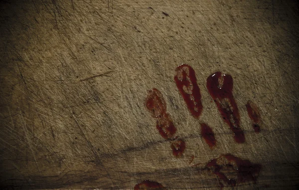 Grunge fundo de madeira com uma impressão de uma mão sangrenta — Fotografia de Stock