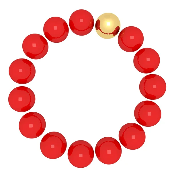 Красные шарики и золотой шар — стоковое фото