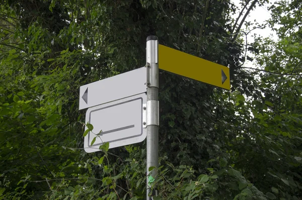 Forest road in the forest with pointers — Stock Photo, Image