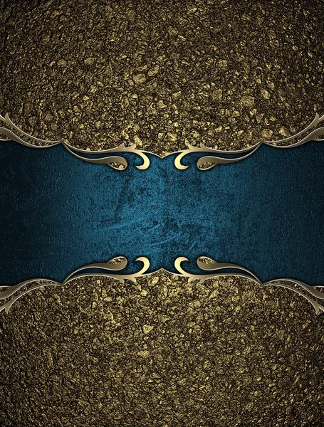 Areia de textura dourada com sinal azul e guarnição dourada — Fotografia de Stock