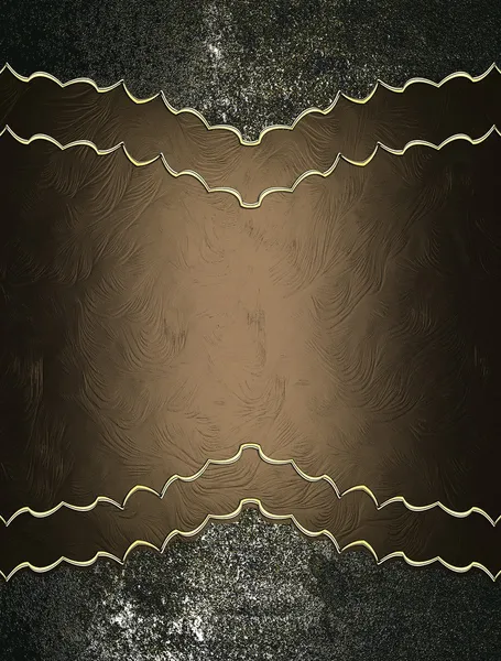Железный фон с коричневой пластиной с золотой отделкой — стоковое фото