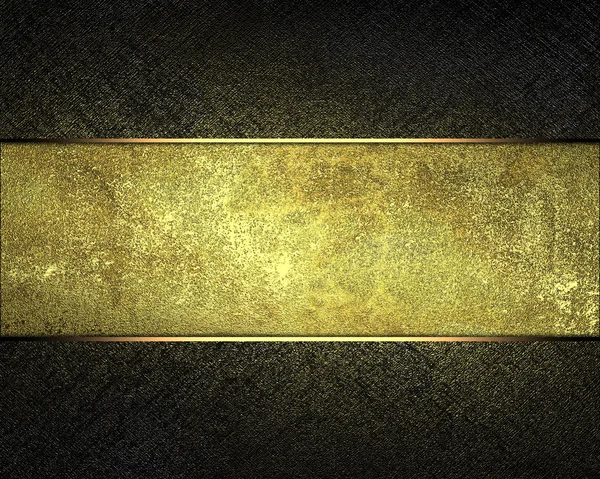 Dark texture with gold scuffed with a gold nameplate — Stock Photo, Image