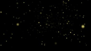 parçacıkları ile uçan sarı topu. arka planını sihirli Parlatıcı