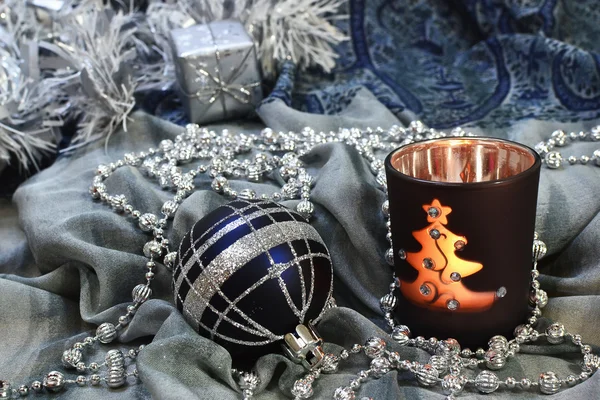 Christmas background with ornaments and candle — Stock Photo, Image