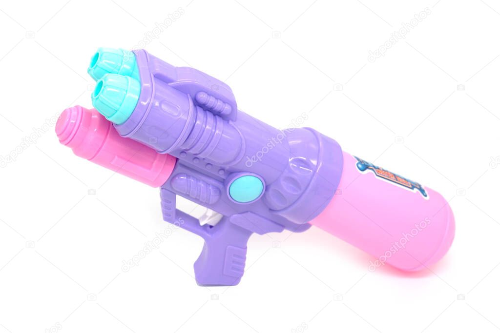Purple toy Water Gun on white background