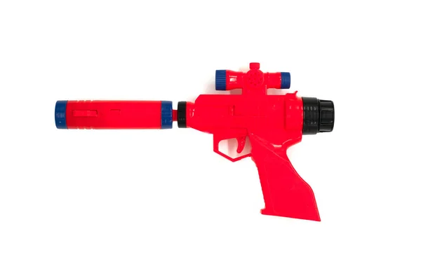 白色背景的红色玩具枪 — 图库照片