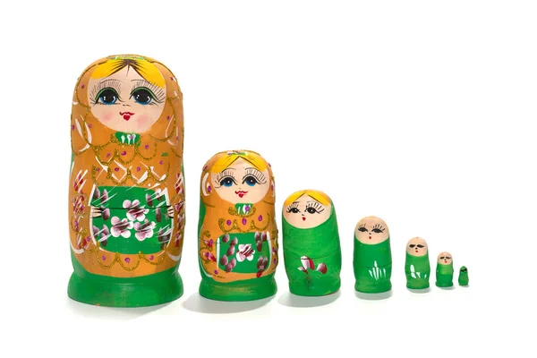 Bright colored nesting dolls on a white background. Russian national souvenir — Stock Photo, Image