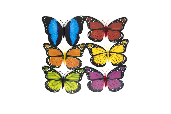 Close-up z tworzyw sztucznych kolorowe zabawki motyl izolowane na białym. — Zdjęcie stockowe
