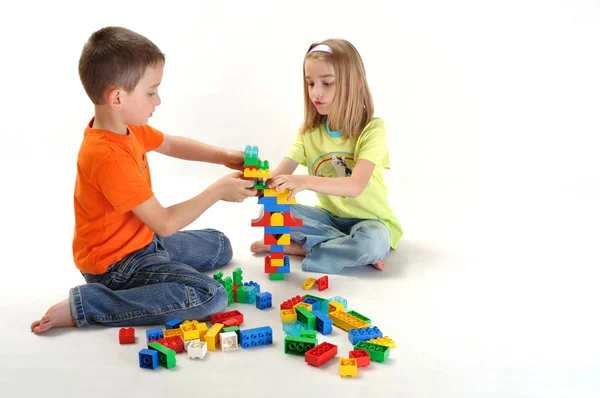 Two children playing Royalty Free Stock Photos