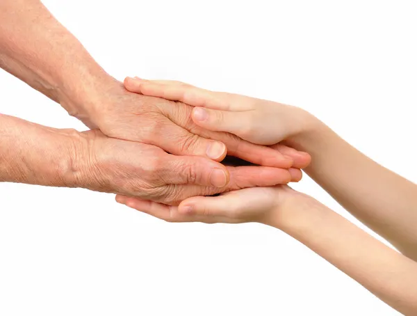 Children's hands embrace old hands — Stock Photo, Image