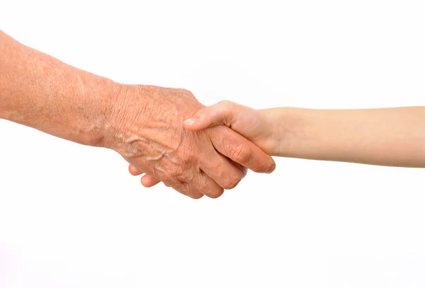 Generations - grandmother and grandchild handshake — Stock Photo, Image