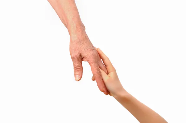 Бабушка и внук нежно держатся за руки — стоковое фото