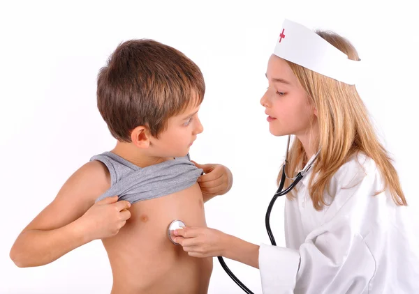 Enfants-frère et soeur jouant médecin Photo De Stock