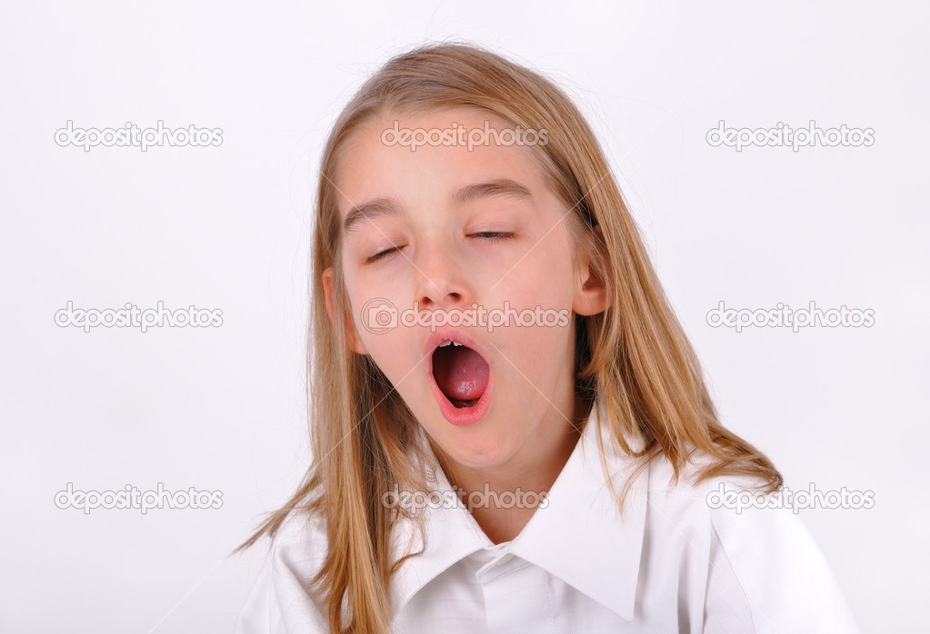 Little girl yawning