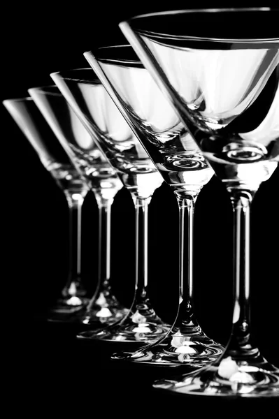 Empty martini glasses on a black — Stock Photo, Image