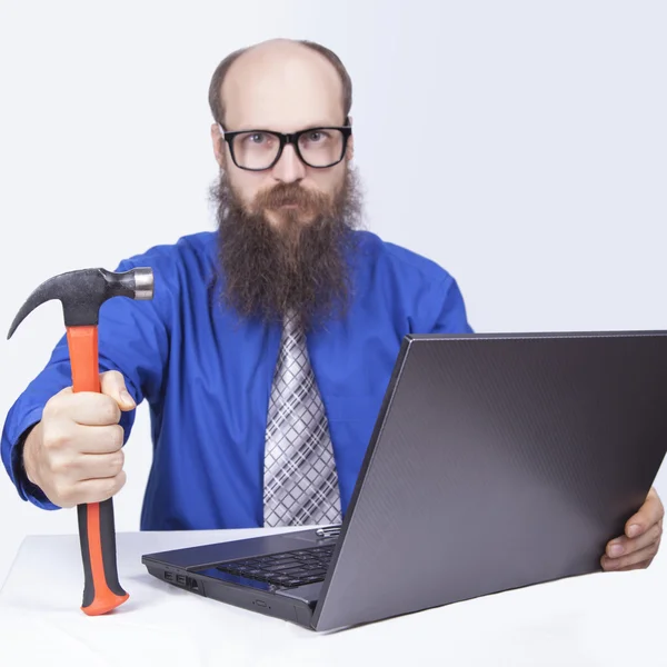 Angry businessman and hammer — Stock Photo, Image