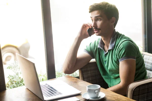 Side View Portrait Man Employee Wearing Green Shirt Talking Phone — Stock Photo, Image