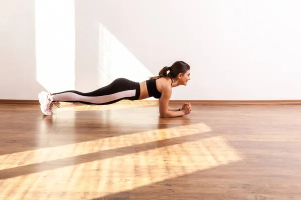 Side View Sportive Woman Practicing Yoga Doing Plank Exercise Bent — Stock Photo, Image