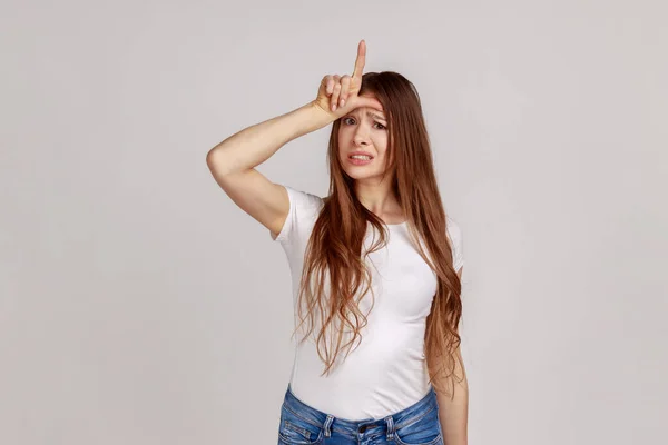 Portrait Displeased Young Woman Standing Hand Forehead Showing Loser Gesture — Fotografia de Stock