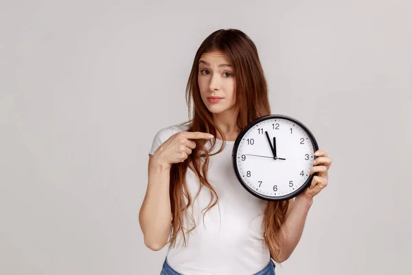 Portrait Beautiful Punctual Woman Pointing Finger White Display Big Wall — Stockfoto