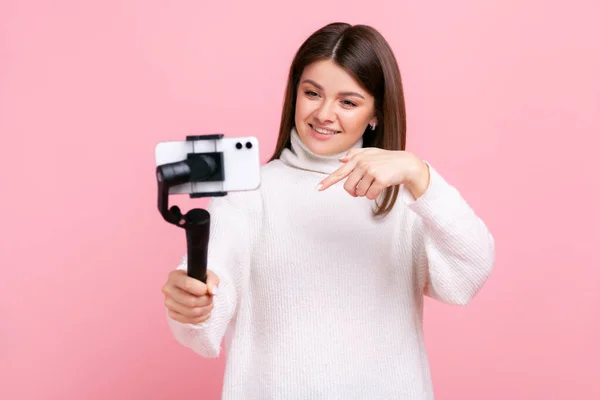 Woman Using Cell Phone Steadicam Broadcasting Livestream Pointing Asking Subscribe – stockfoto