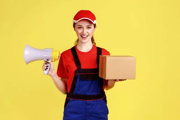 Portrait Optimistic Courier Woman Standing Holding Cardboard Box Megaphone Looking — стоковое фото