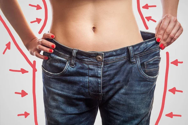 Closeup Slim Waist Young Woman Standing Big Jeans Showing Successful — Foto Stock