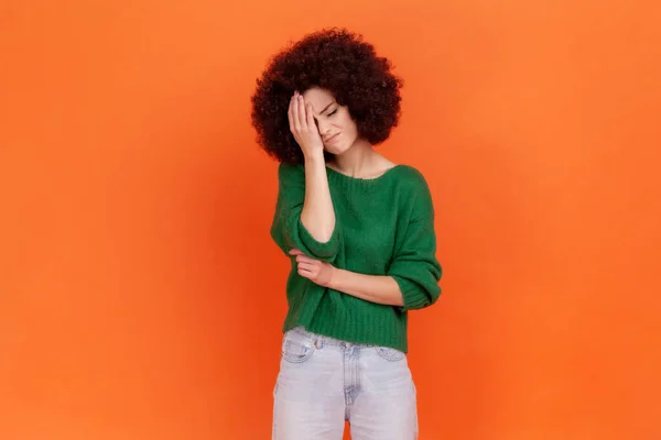 Sad Woman Afro Hairstyle Wearing Green Sweater Making Facepalm Gesture — стокове фото