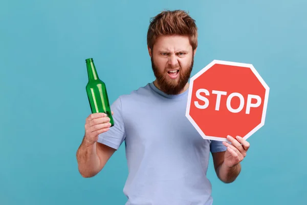 Portrait Bearded Man Showing Alcoholic Beverage Beer Bottle Stop Sign — 스톡 사진