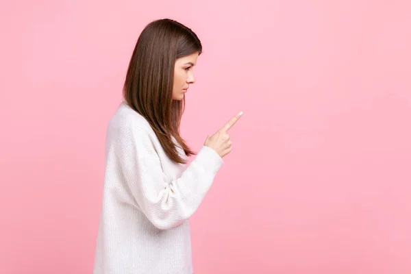 Side View Portrait Strict Female Raised Finger Showing Warning Gesture — стоковое фото