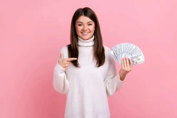 Positive Smiling Woman Pointing Fan Dollar Banknotes Looking Camera Happy — 스톡 사진