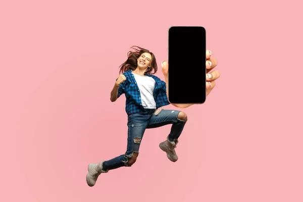 Happy Young Woman Flying Jumping Air Showing Big Mobile Empty — Fotografia de Stock