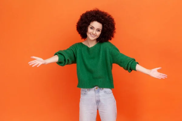 Pleased Woman Afro Hairstyle Wearing Green Casual Style Sweater Widely — Stockfoto